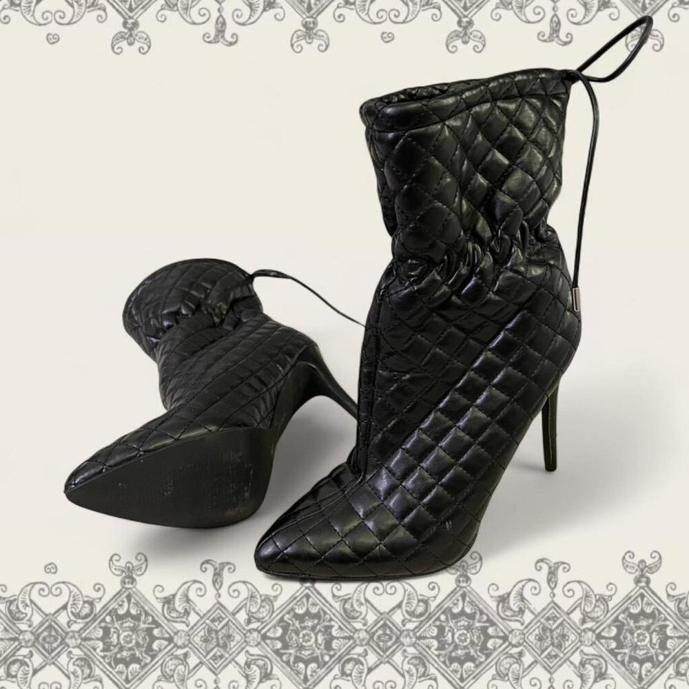 Black stiletto quilted ankle boots with strings to tie in the back